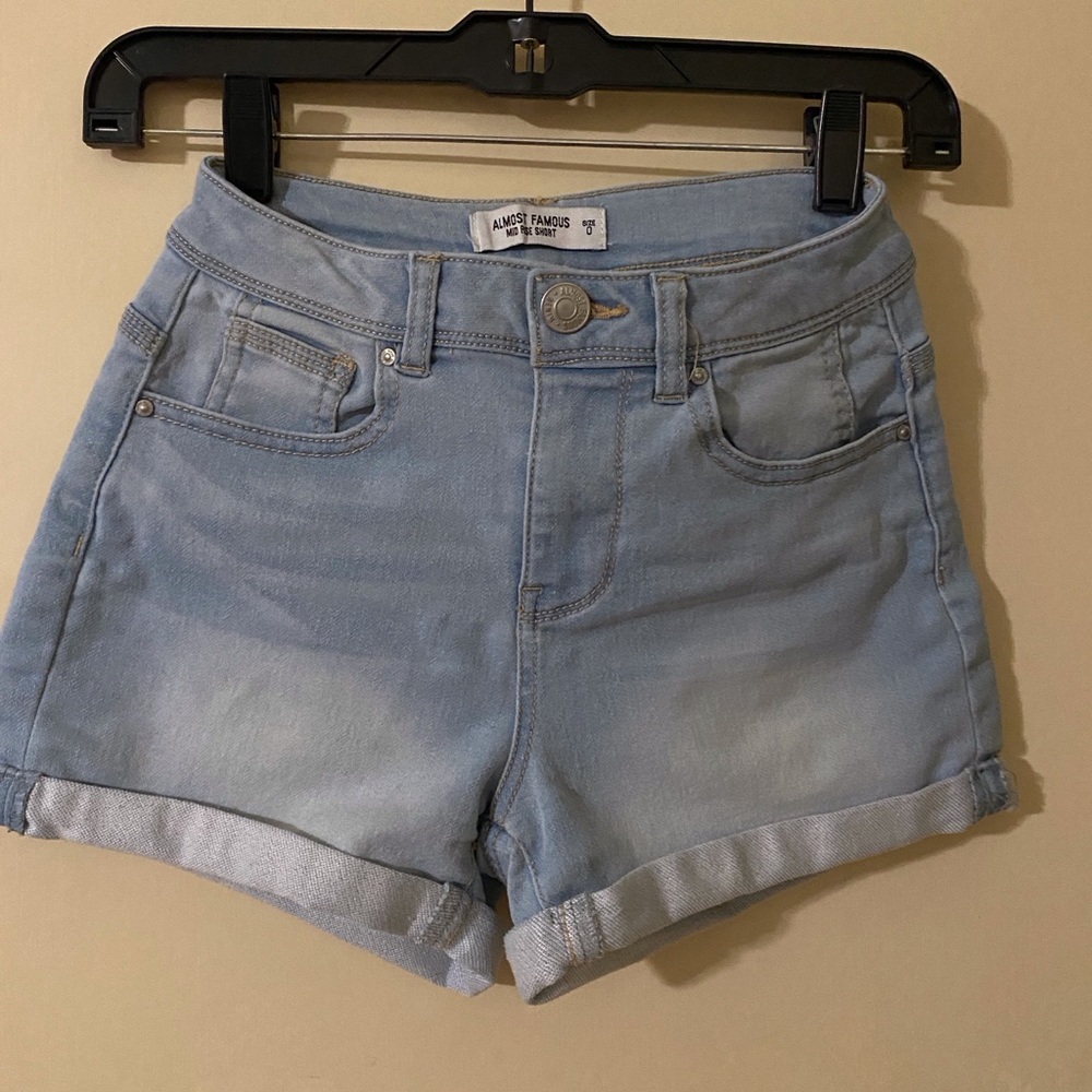 Almost Famous mid- rise denim shorts size 0.  5 pockets, light wash, 2” inseam